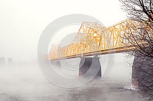 George Rogers Clark Memorial Bridge over River Ohio covered in the fog