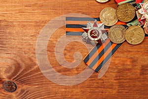 George's Ribbon and Medals for the victory over Germany on a wooden