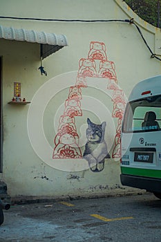 George Town, Malaysia - March 10, 2017: Love Me Like Your Fortune Cat mural, street art in the city.