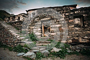 Georgia. Cow Lying In Shed In Georgian Village