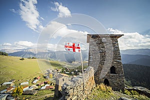 Georgia flag mountain village towers tourism