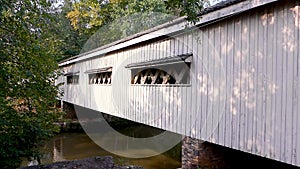 Georgia Hurricane Shoals Park  A side view of the covered bridge with the North Oconee River