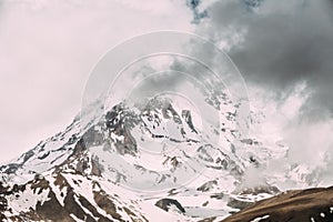 Georgia. Peak Of Mount Kazbek Covered With Snow