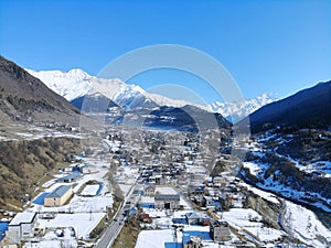 Georgia. Svaneti Region, mountain city Mestia. Land of Towers. View from above, perfect landscape photo, created by drone. Aerial