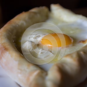 Georgian cheese pie with egg - adzharian khachapur