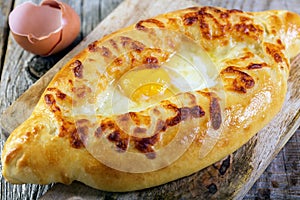 Georgian cheese pie and yolk closeup.