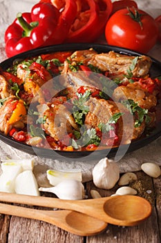 Georgian cuisine: chicken stew with vegetables close-up. vertica photo