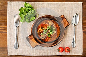 Georgian dish with Chakhokhbili chicken in a skillet