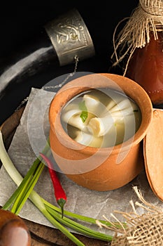 Georgian dish, khinkali in a pot