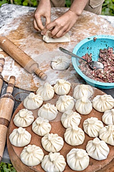 Georgian food Woman making khinkali