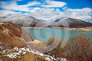 Georgian Mountains Panorama View with Clouds and Blue Sky