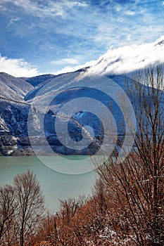 Georgian Mountains Panorama View with Clouds and Blue Sky