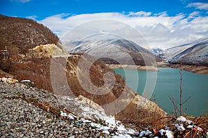 Georgian Mountains Panorama View with Clouds and Blue Sky