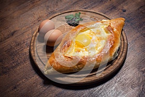 Georgian traditional baked meal khachapuri;