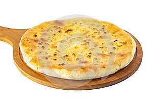 Georgian traditional food khachapuri on a wooden dish on white background