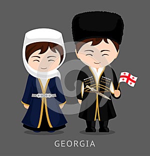 Georgians in national dress with a flag. photo