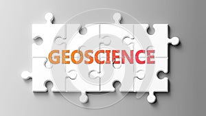 Geoscience complex like a puzzle - pictured as word geoscience on a puzzle pieces
