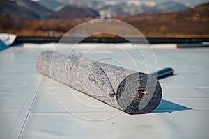 Geotextile for roof, covered with synthetic PVC membrane photo