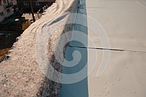 Geotextile support layer for PVC and EPDM synthetic membrane roof