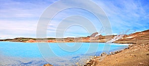 Geothermal landscape with beautiful azure blue crater lake, Myvatn area, Iceland