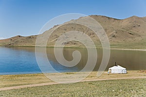 A ger on the side of a lake. Mongolia.