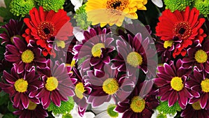 Gerbera and chrysanthemum flowers in a bouquet from above