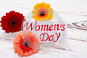 Gerberas and Women`s Day card.