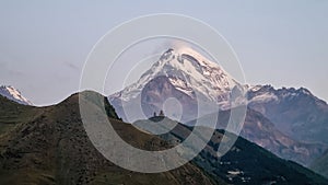 Gergeti Glacier - Distant view on Gergeti Trinity Church in Stepansminda, Georgia