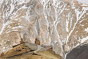 Gergeti temple on top foot Kazbek mountain