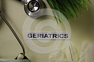 Geriatrics with inspiration and healthcare/medical concept on desk background