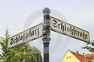 German antique street sign with two street names