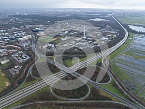 German autobahn infrastructure and interstate crossing. Birds eye aerial drone view. Hannover, Germany.