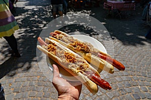german bavarian hot dog in viktualienmarkt munich with sauerkraut street food photo