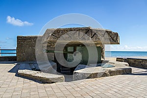 German Blockhaus and 50 mm anti tank gun at St Aubin-sur-Mer, World War 2 Atlantic Wall remnant, Normandy