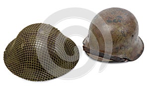 German and British World War Two military helmets, battle of Normandy 1944