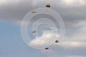 German Bundeswehr paratroopers in camouflage during a parachute jump photo