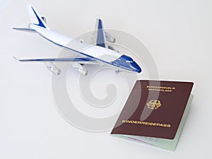 German children passport with plane