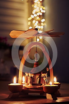 German christmas pyramid from the erzgebirger with christmas carolers, star singers as wooden figures