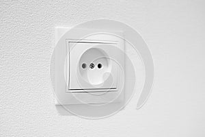 German circular recess socket with two round holes for 2 pins europlugs types C, E and F. Common cheap plastic AC power