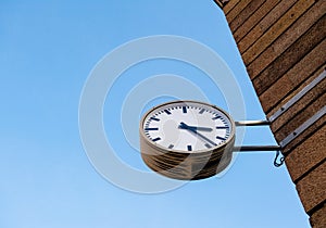 German clock on the street - low angle view of traditional urban furniture