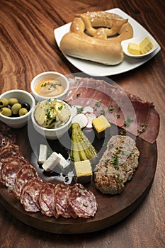 German cold cuts tapas snack platter with meats and bread