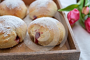 German donuts - krapfen or berliner - filled with jam