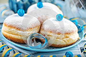 German donuts - krapfen or berliner - filled with jam for carnival.