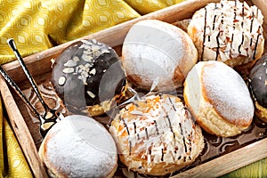German donuts - krapfen or berliner - filled with jam for carnival.