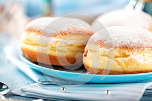 German donuts - krapfen or berliner - filled with jam for carnival.