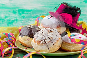 German donuts - krapfen or berliner - filled with jam for carnival.