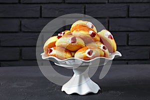 German Donuts with Raspberry Jam and cream