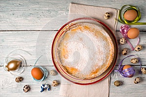German Easter cake on a ceramic dish and eggs