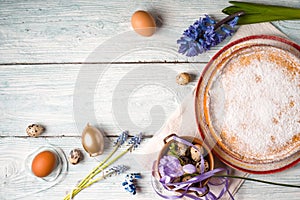 German Easter cake with decoration and flower on the white wooden table