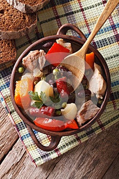 German eintopf soup with meat and vegetables close-up vertical t